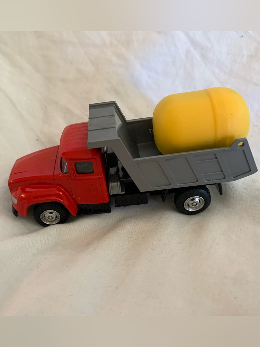 Red and Gray Kids Dump Truck Toy with Yellow Barrel Accent